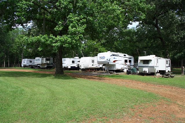 Multiple Rv Parks Set In A Lush Grassy Field