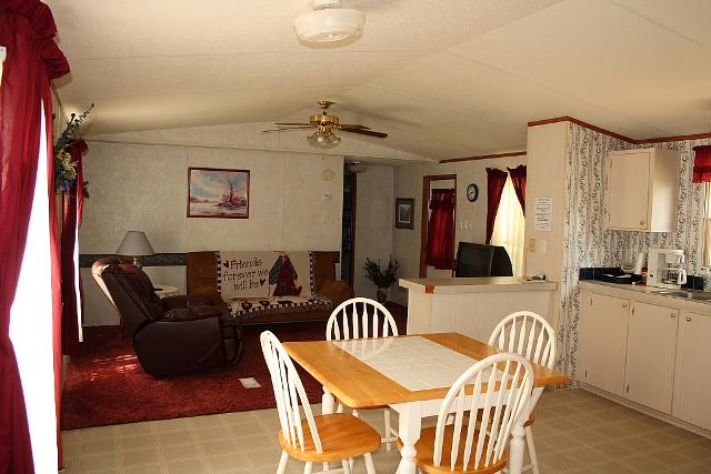 Cozy Kitchen And Dining Area In A Mobile Home