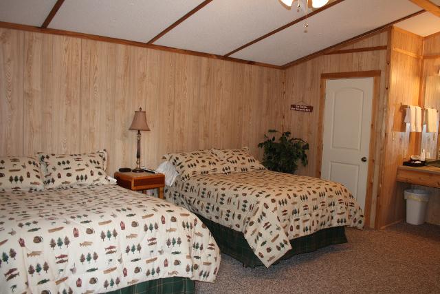 Two Beds In A Cozy Cabin